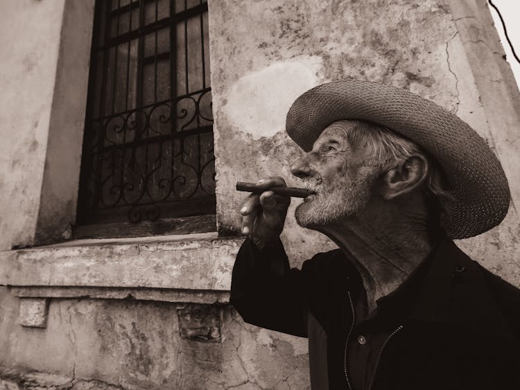 Elderly Man Smoking Cigar