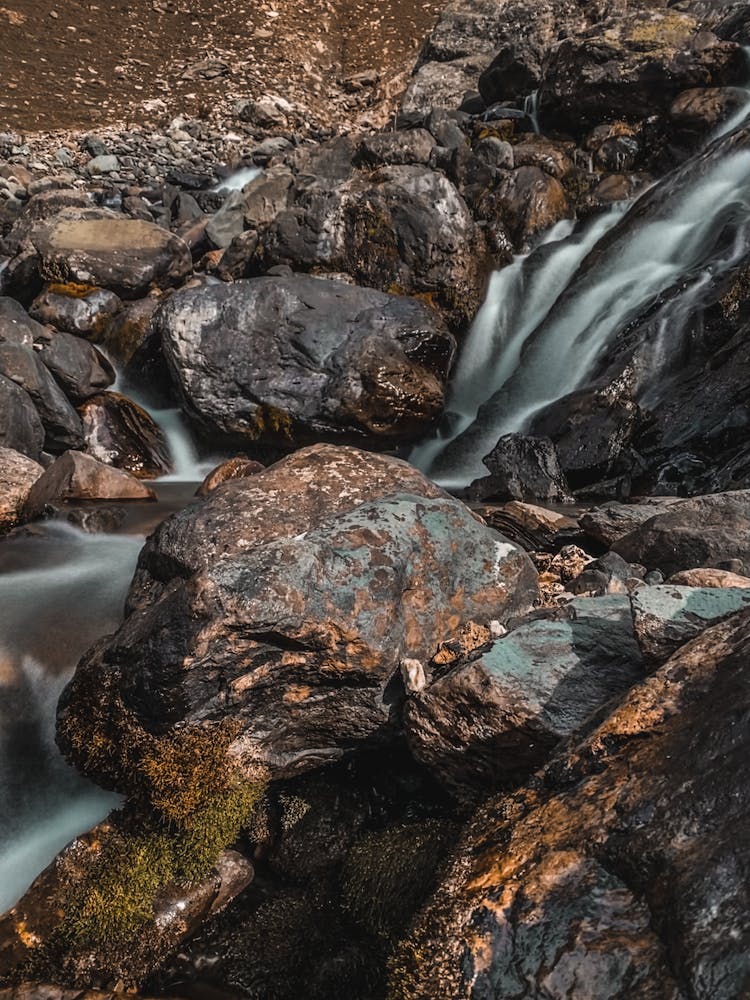 Brown Rocks On River