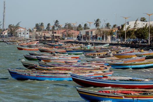 Vibrant fishing boats docked at Parnaíba pier, showcasing coastal life and local culture.