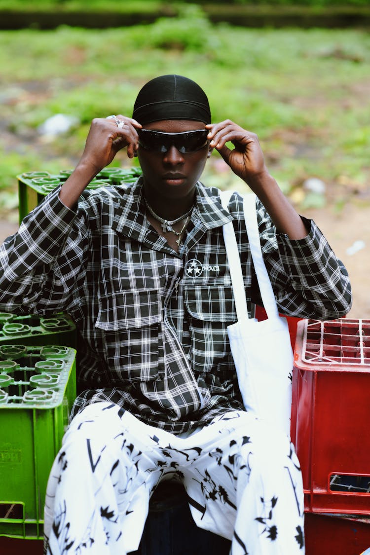 Man In Sunglasses Sitting