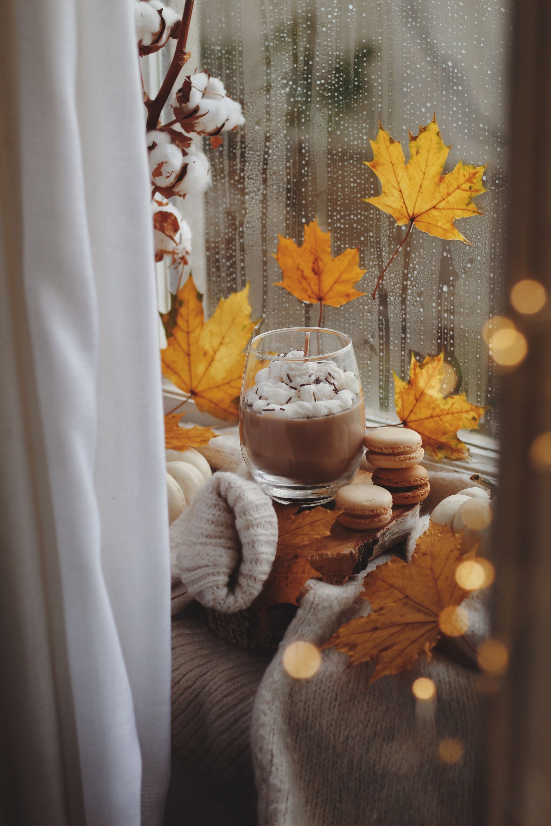Bedroom window framed by autumn tones outside