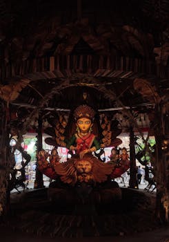 Intricate idol of Goddess Durga at a traditional Kolkata Durga Puja festival.