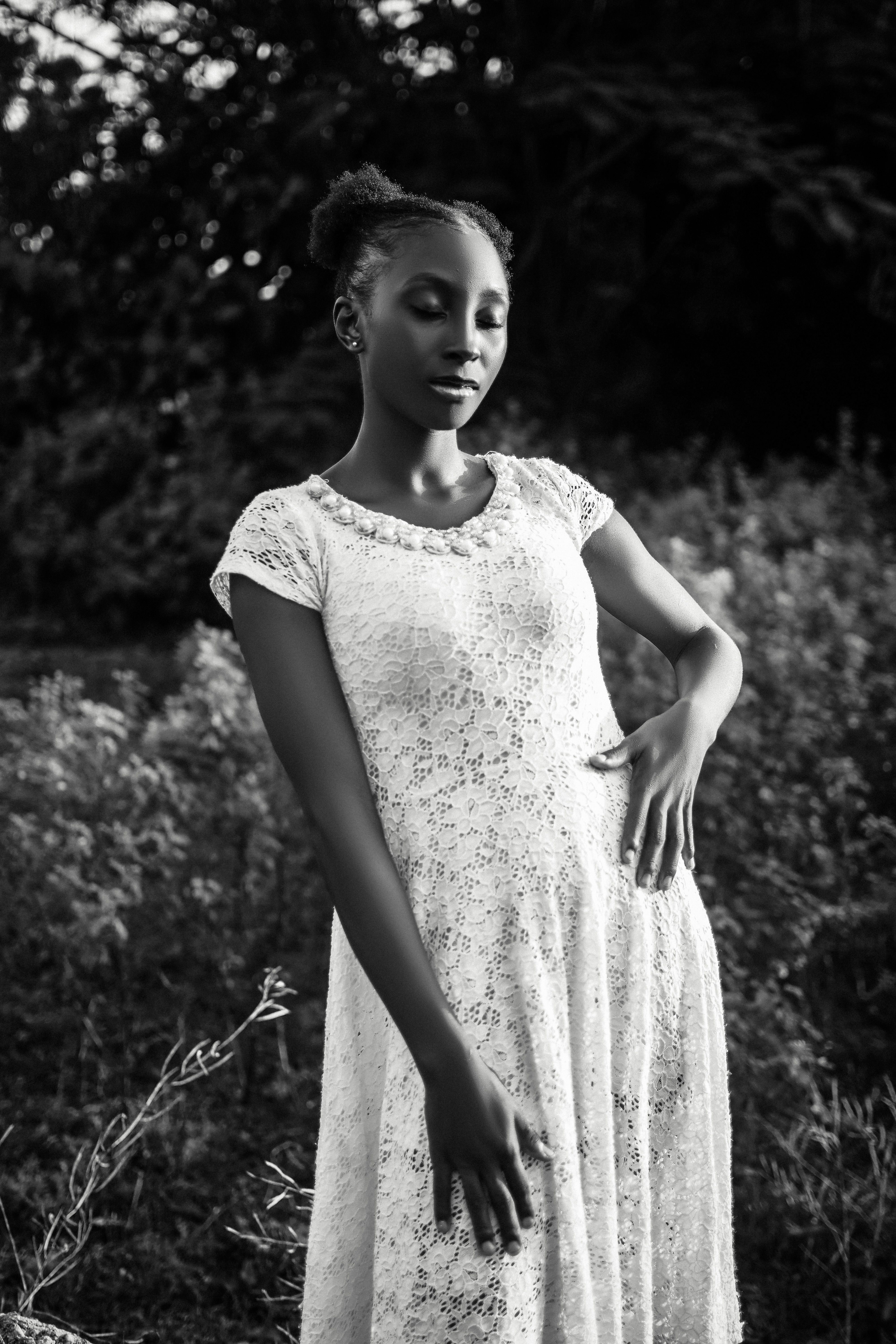 Grayscale Photo of a Woman in White Dress · Free Stock Photo