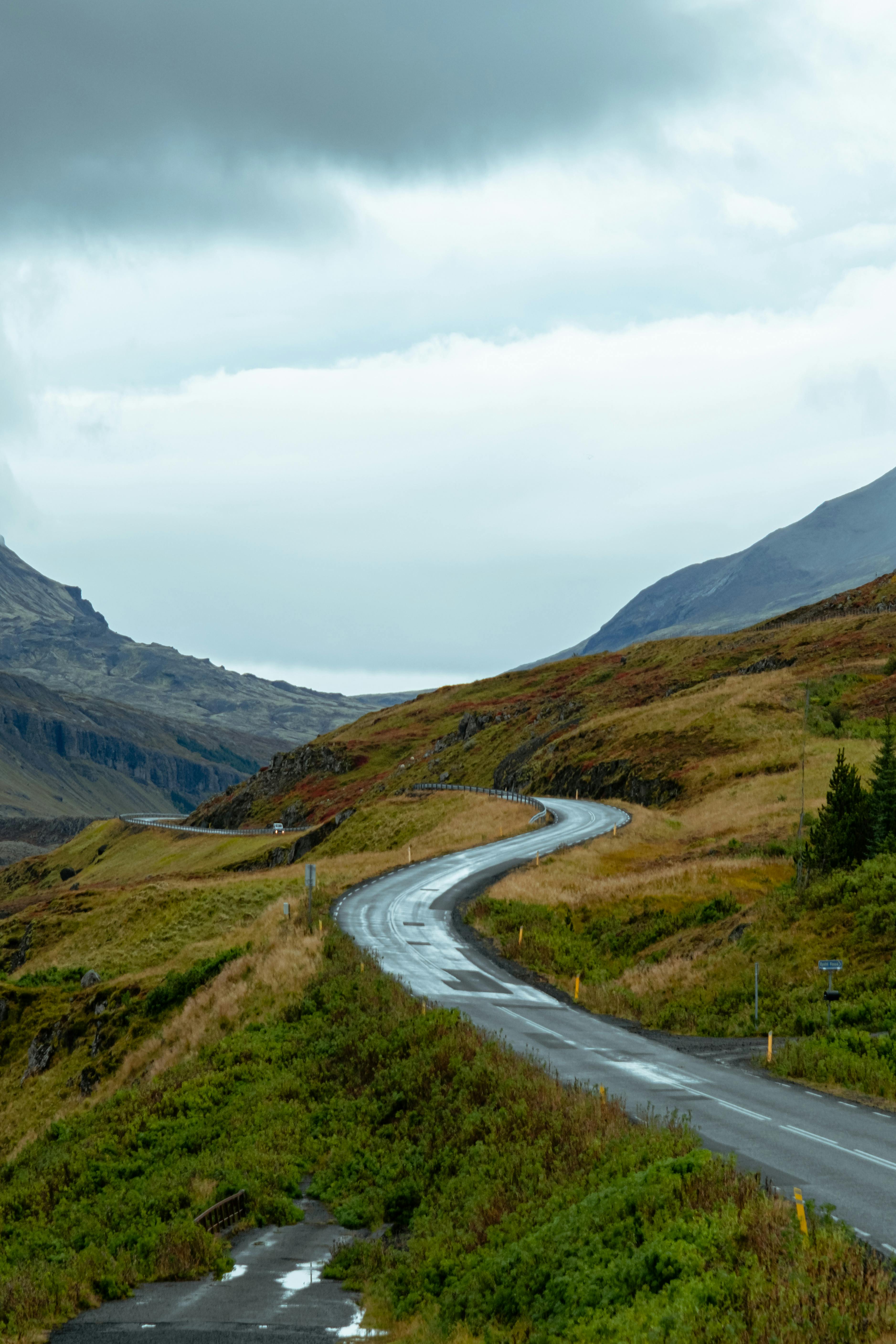 Gravel Hills and a Road · Free Stock Photo