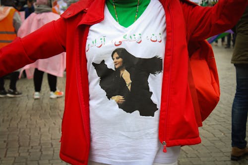 Foto profissional grátis de caligrafia árabe, camisa, camisa impressa