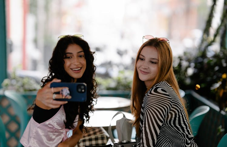 Young Girls Taking A Selfie 