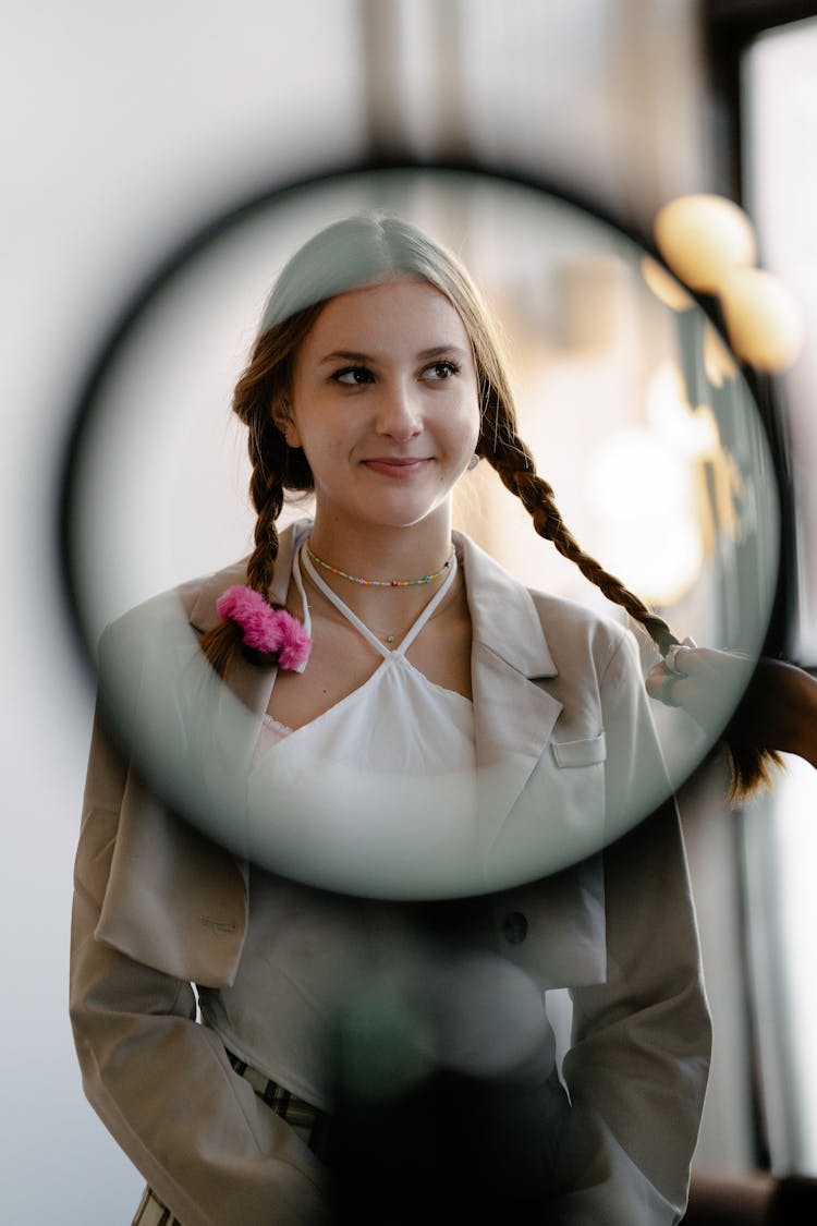 Womans Face With Braided Hair In A Circle