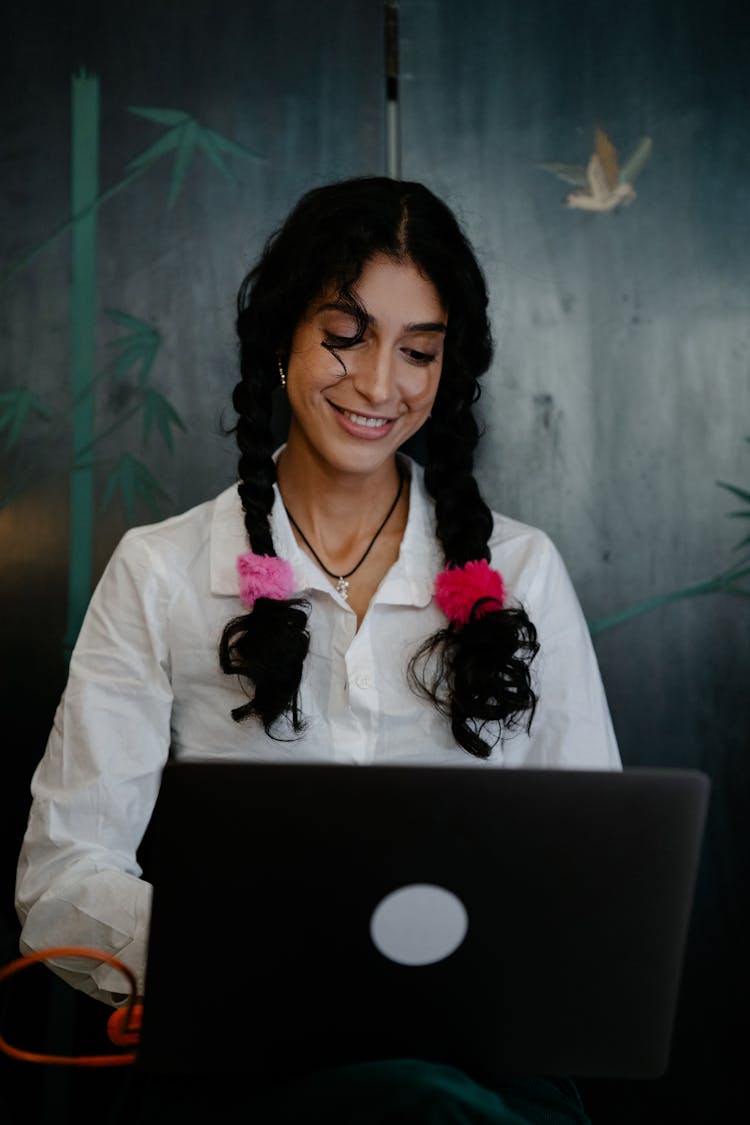 Smiling Woman With Laptop