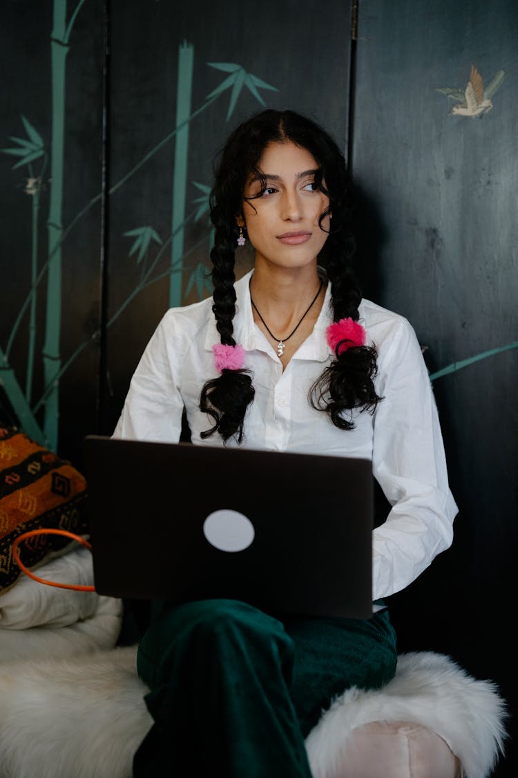 Woman Sitting With Laptop