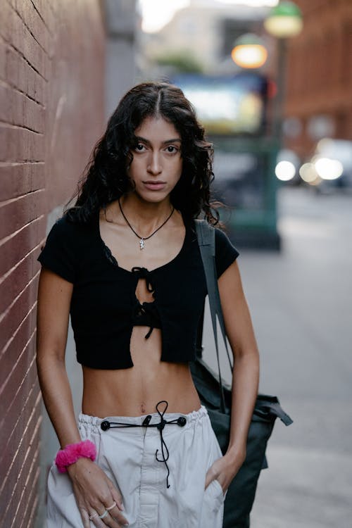 Woman Posing by Wall