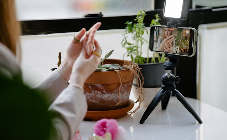 Woman Vlogging With Use Of Smartphone