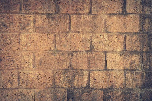 Brown and Black Brick Wall Close Up Shot Photography