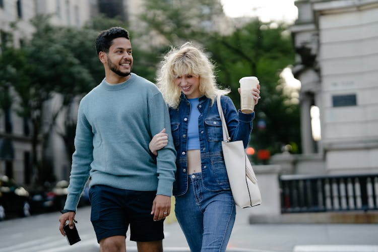 Smiling Woman And Man Walking