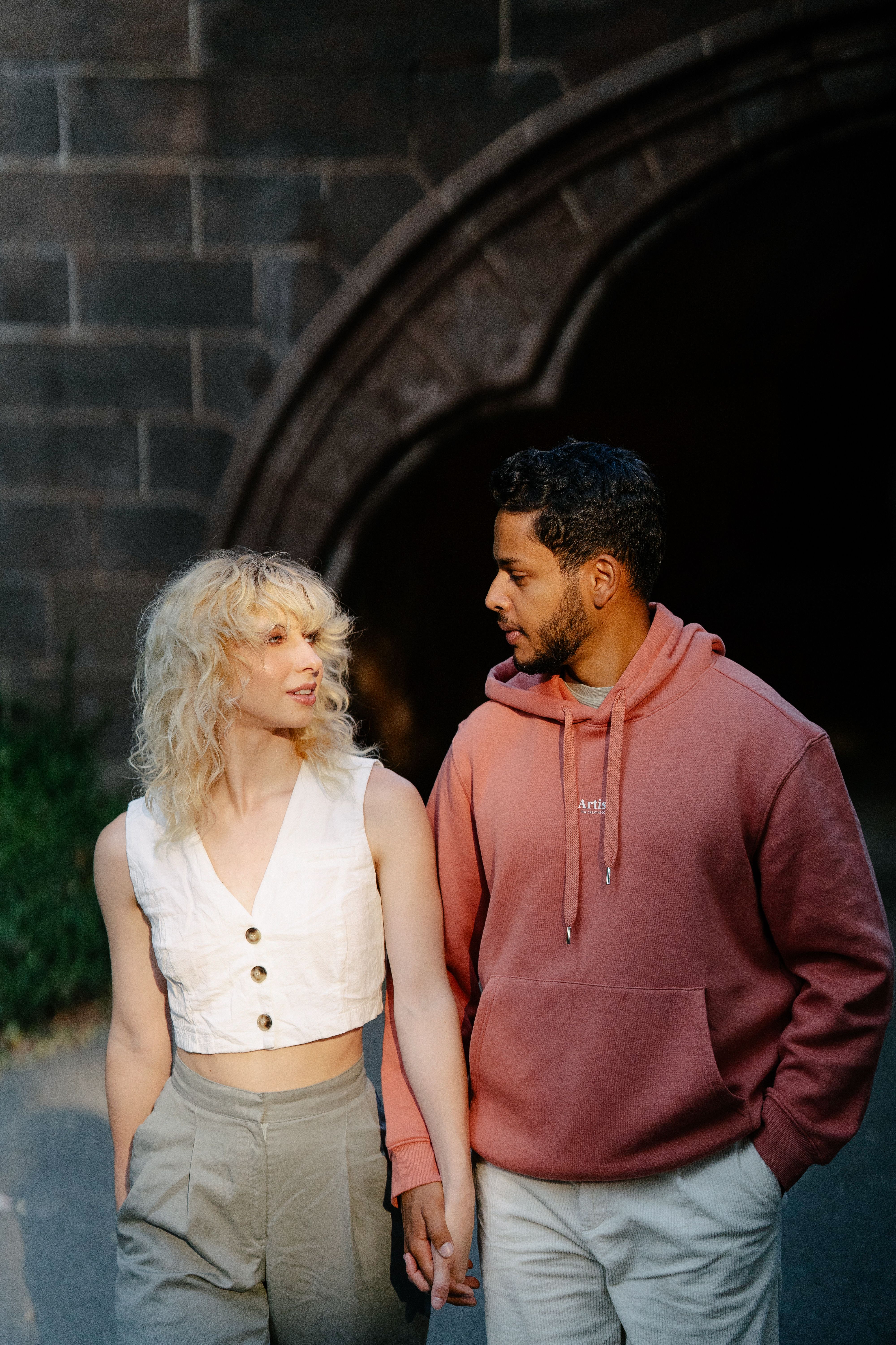 Woman and Man Walking Together · Free Stock Photo