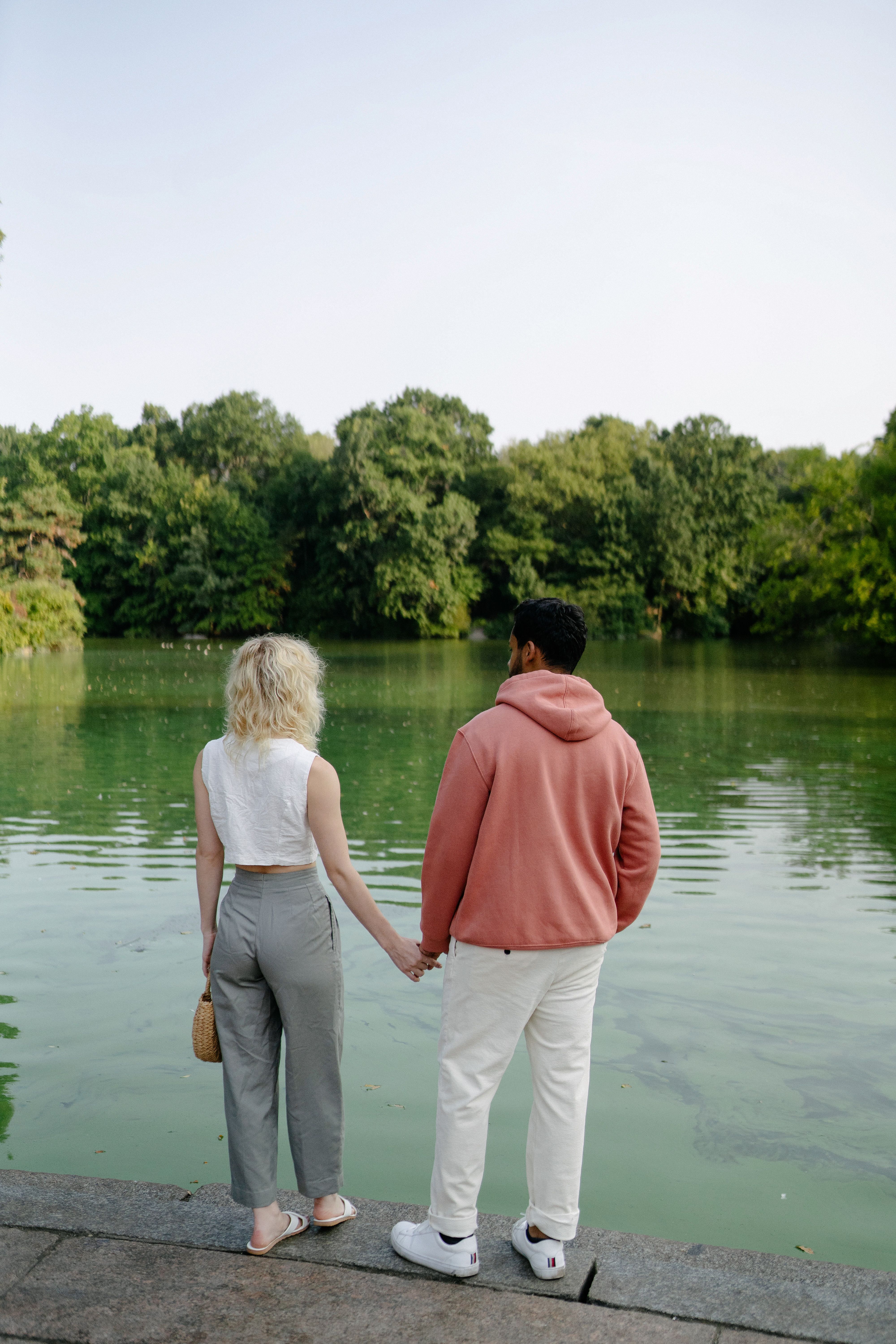 Woman and Man Walking Together · Free Stock Photo