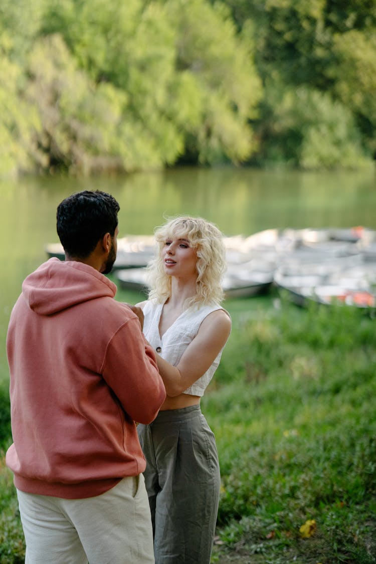 Couple On Riverbank