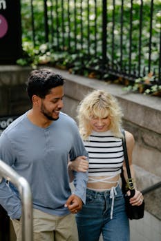Happy couple enjoying a walk in the city. Embracing modern romance and urban lifestyle.