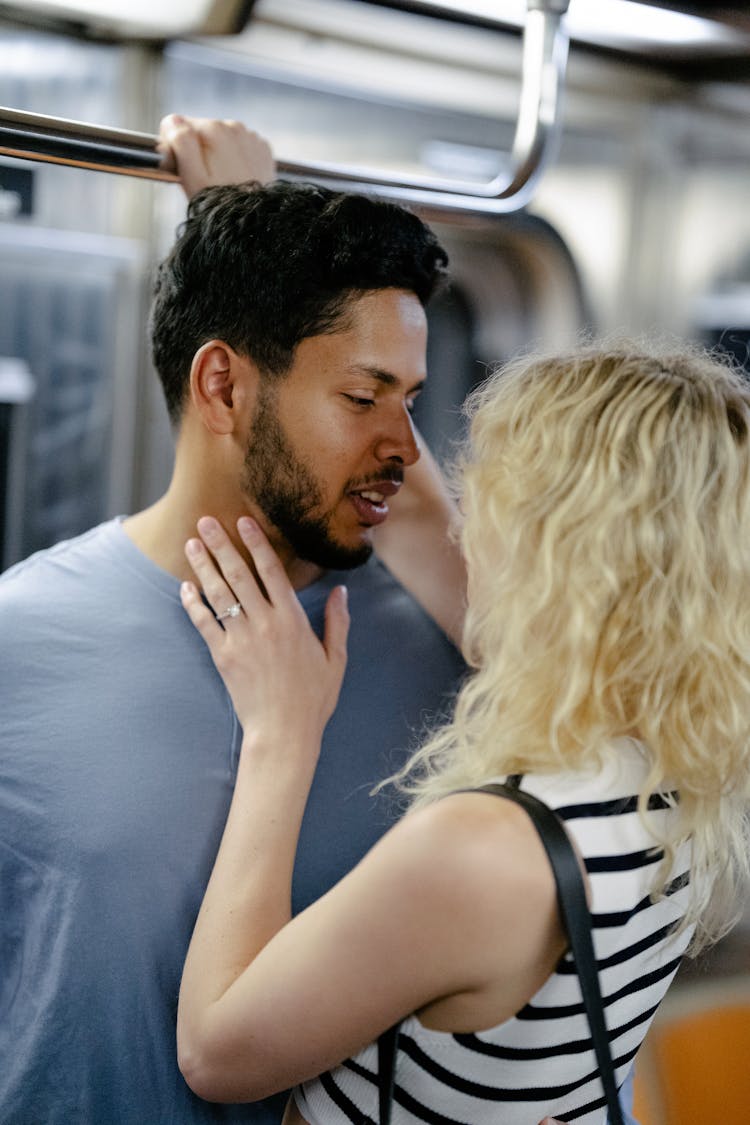 Couple Kissing In A Train