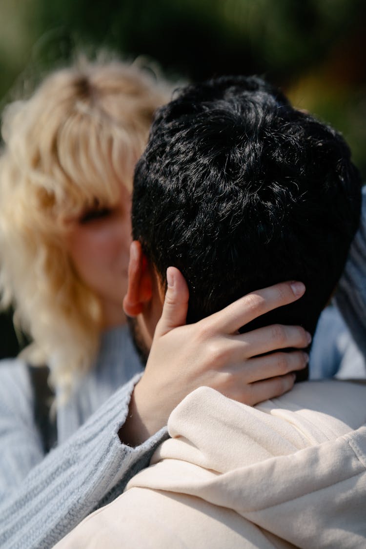 Woman Hugging Man