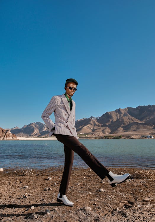 Man Posing on Lakeshore