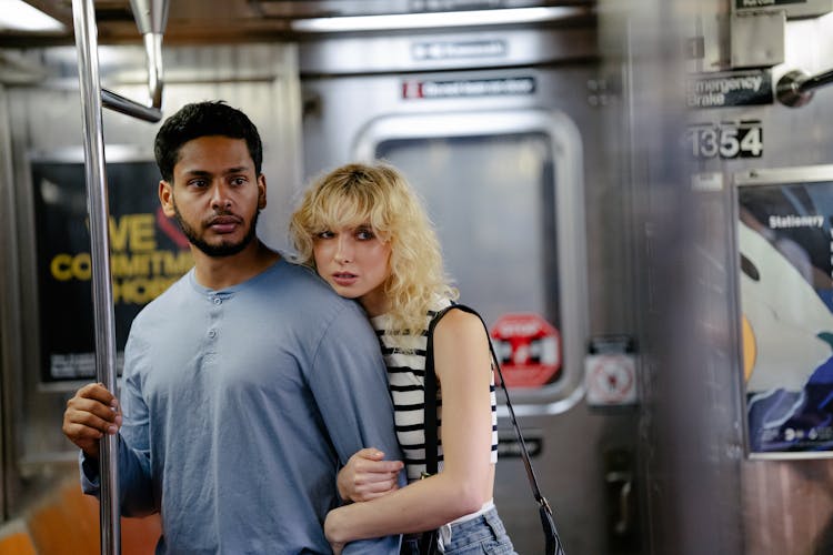 Woman And Man On Metro Train