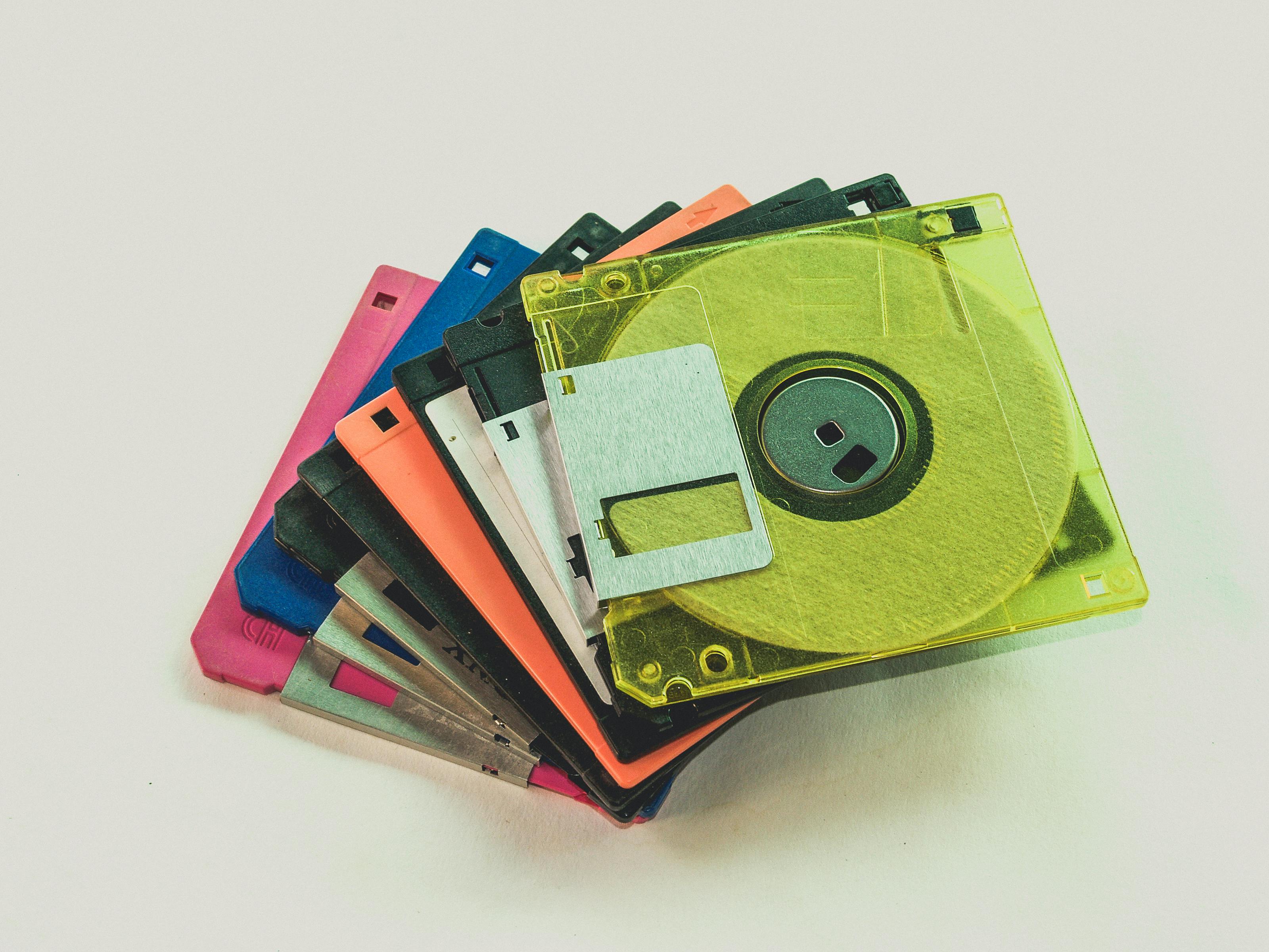 Floppy Disk Lot on White Surface \u00b7 Free Stock Photo