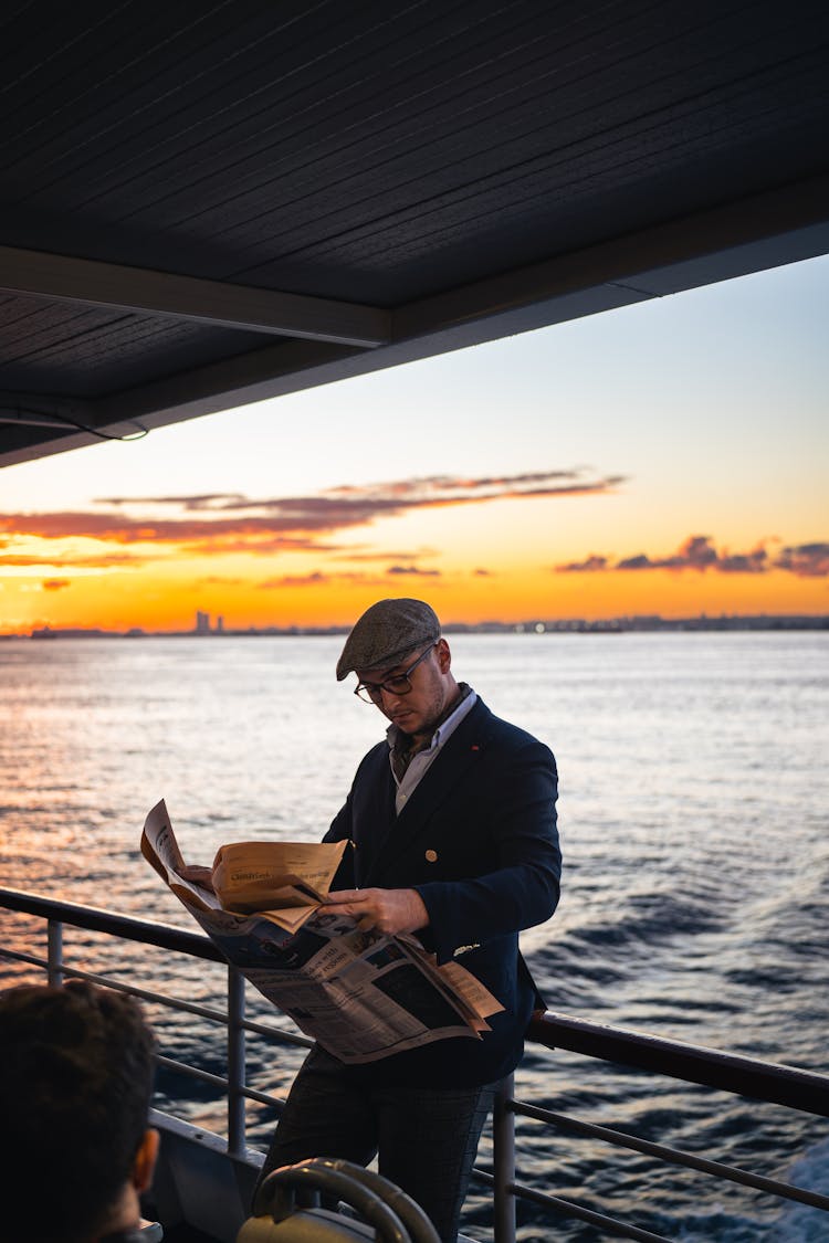 Man Reading The Newspaper