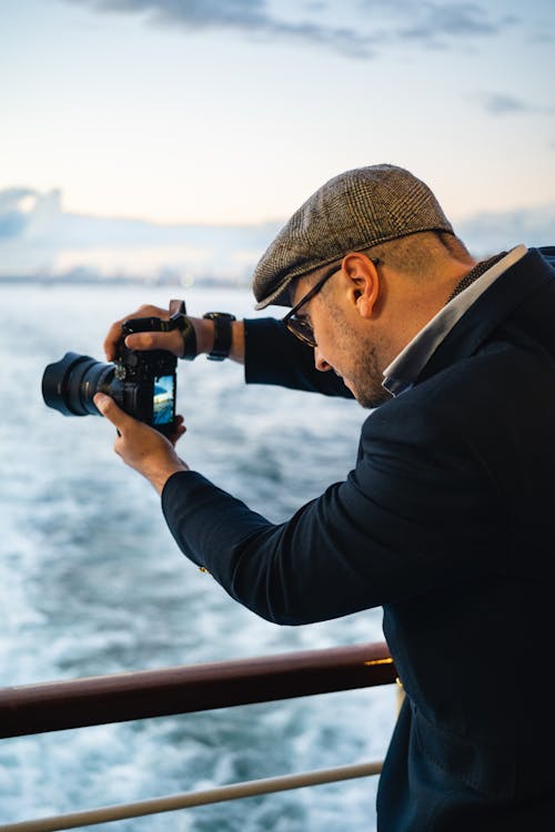 Fotos de stock gratuitas de cámara, fotógrafo, haciendo fotos