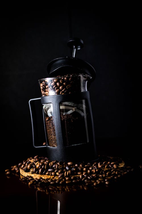 Безкоштовне стокове фото на тему «вертикальні постріл, еспресо, кавові зерна»