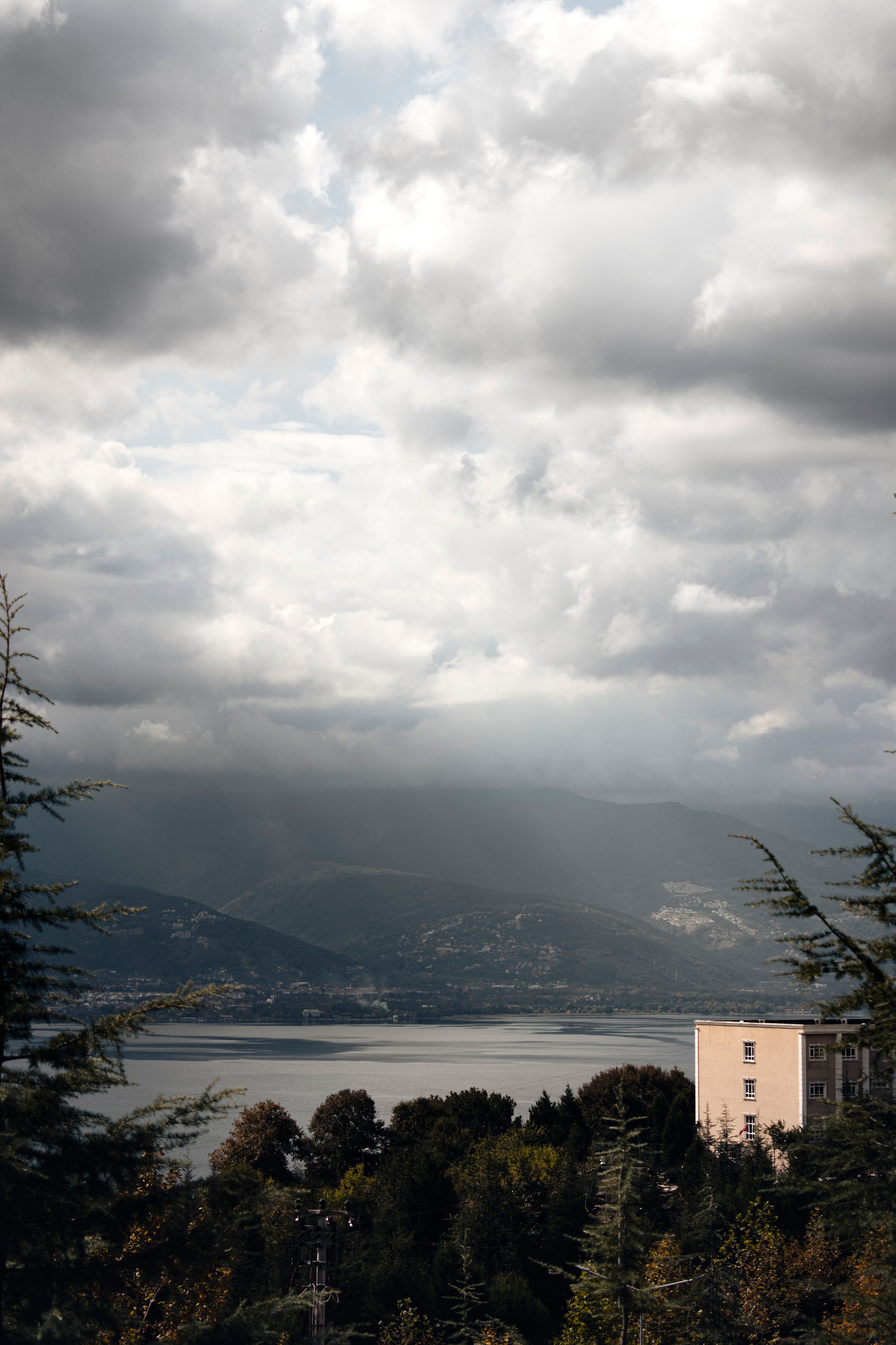 Cloudy Sky over Lake and Mountain · Free Stock Photo