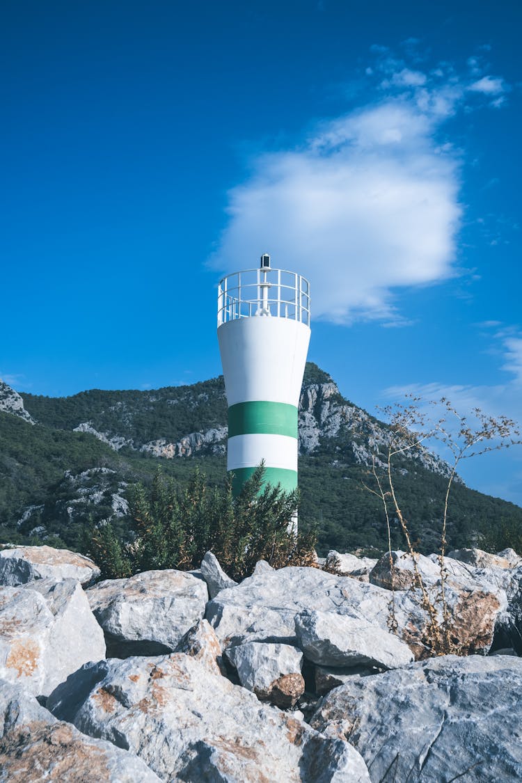 Lighthouse On Rocks