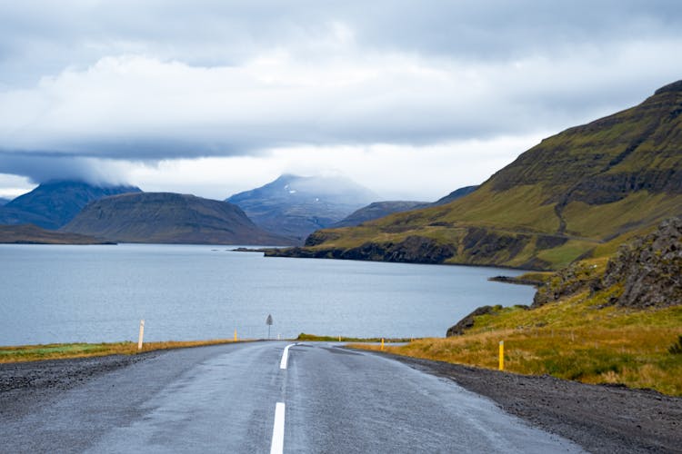 Mountain Road Beside A Lake