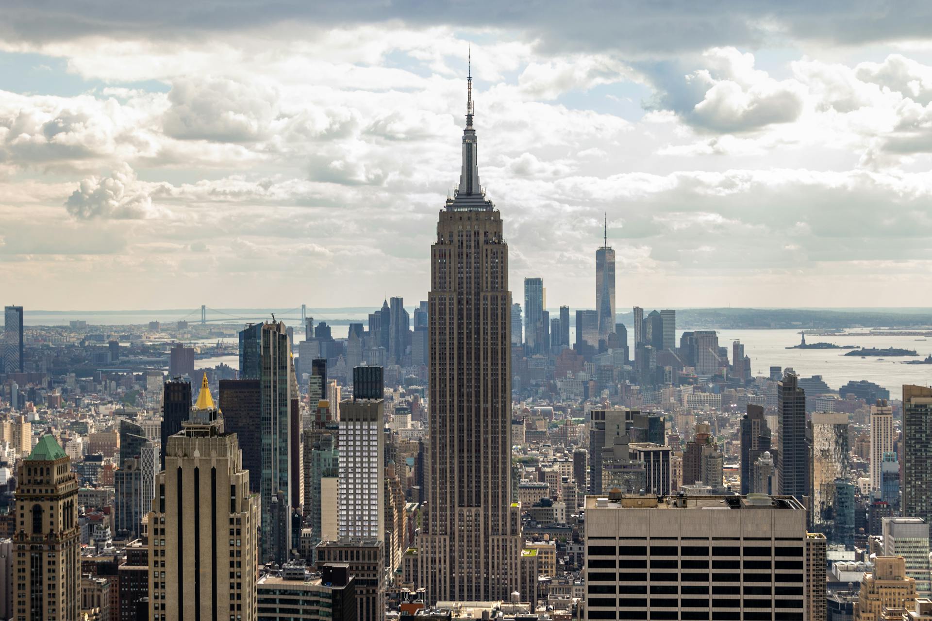 Spectacular aerial view showcasing the iconic Empire State Building amidst New York City's modern skyline.