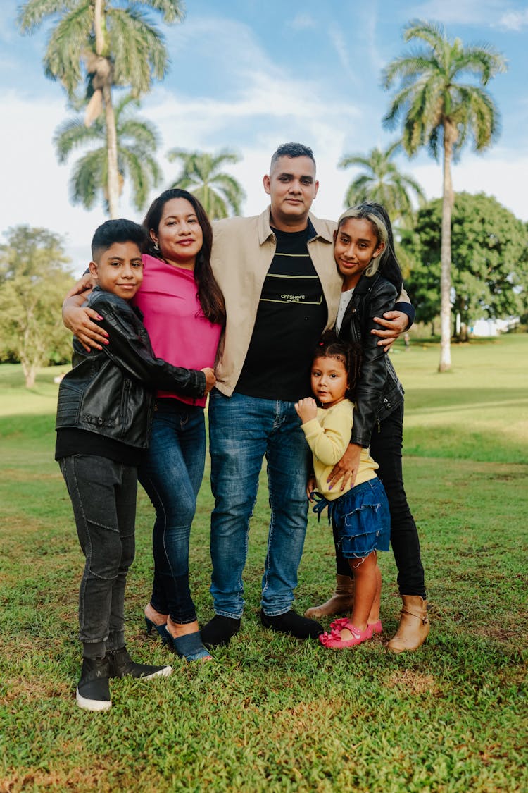 Family Posing In Park