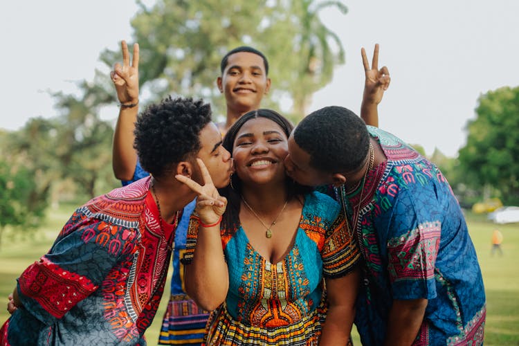 Men Kissing Woman 