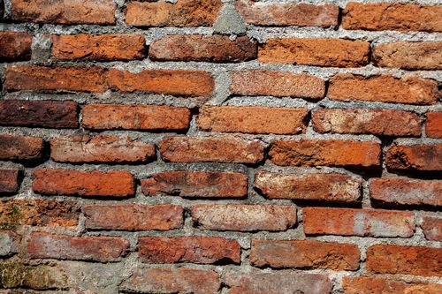 Free Detailed texture of a rustic red brick wall in Mérida, Venezuela. Ideal for backgrounds. Stock Photo