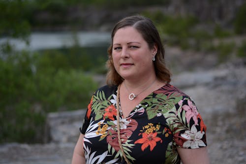 Woman in Black White and Pink Floral Shirt