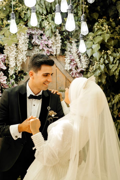 Bride and Groom Holding Hands