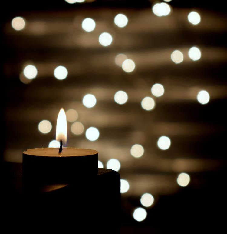 Lighted Candle In Bokeh Photography