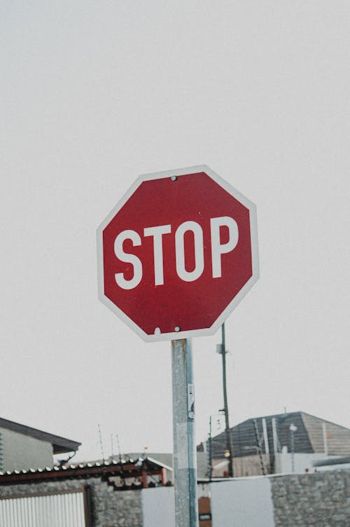 Free A Stop Sign in the Street Stock Photo