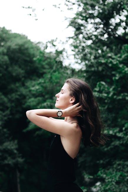 A serene woman enjoying nature in a peaceful Istanbul park, perfect for wellness themes.
