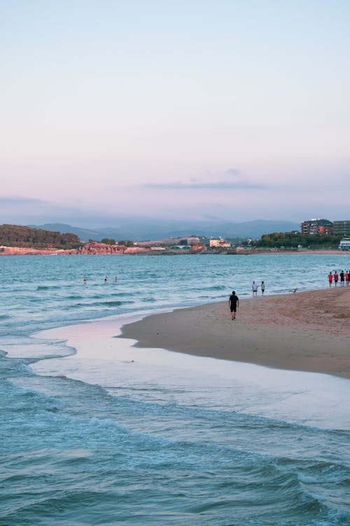 People Walking on the Beach 