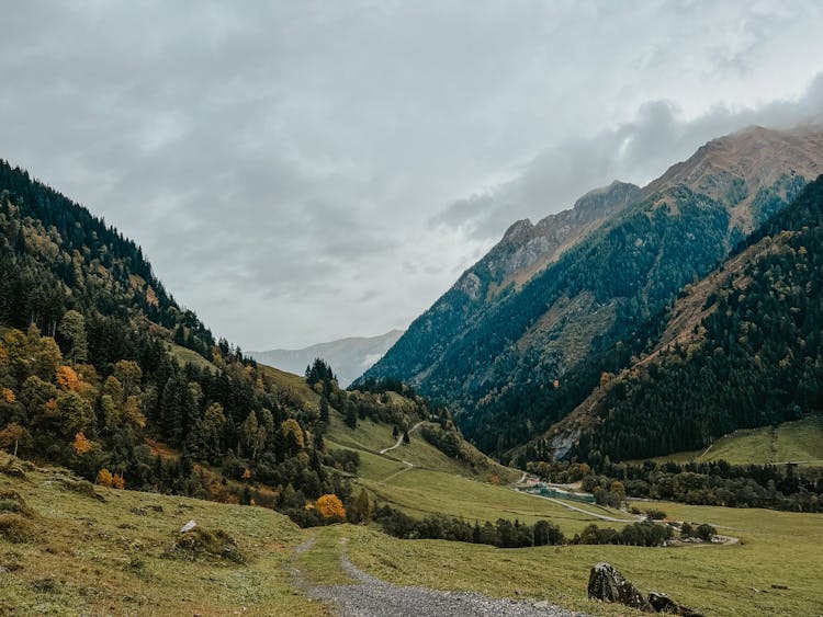 Gravel Path Through Valley In Mountains