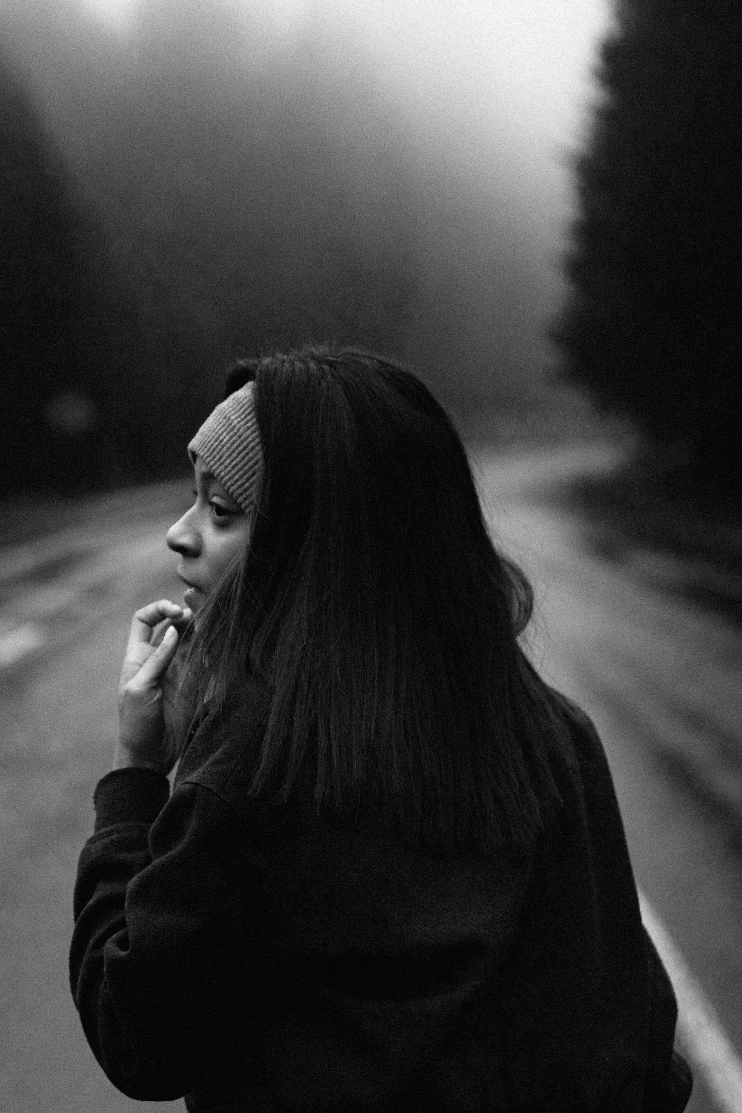 Grayscale Photo of Woman in Long Sleeve Shirt · Free Stock Photo