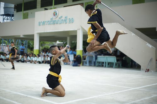 Photo of Boys Fighting With Swords