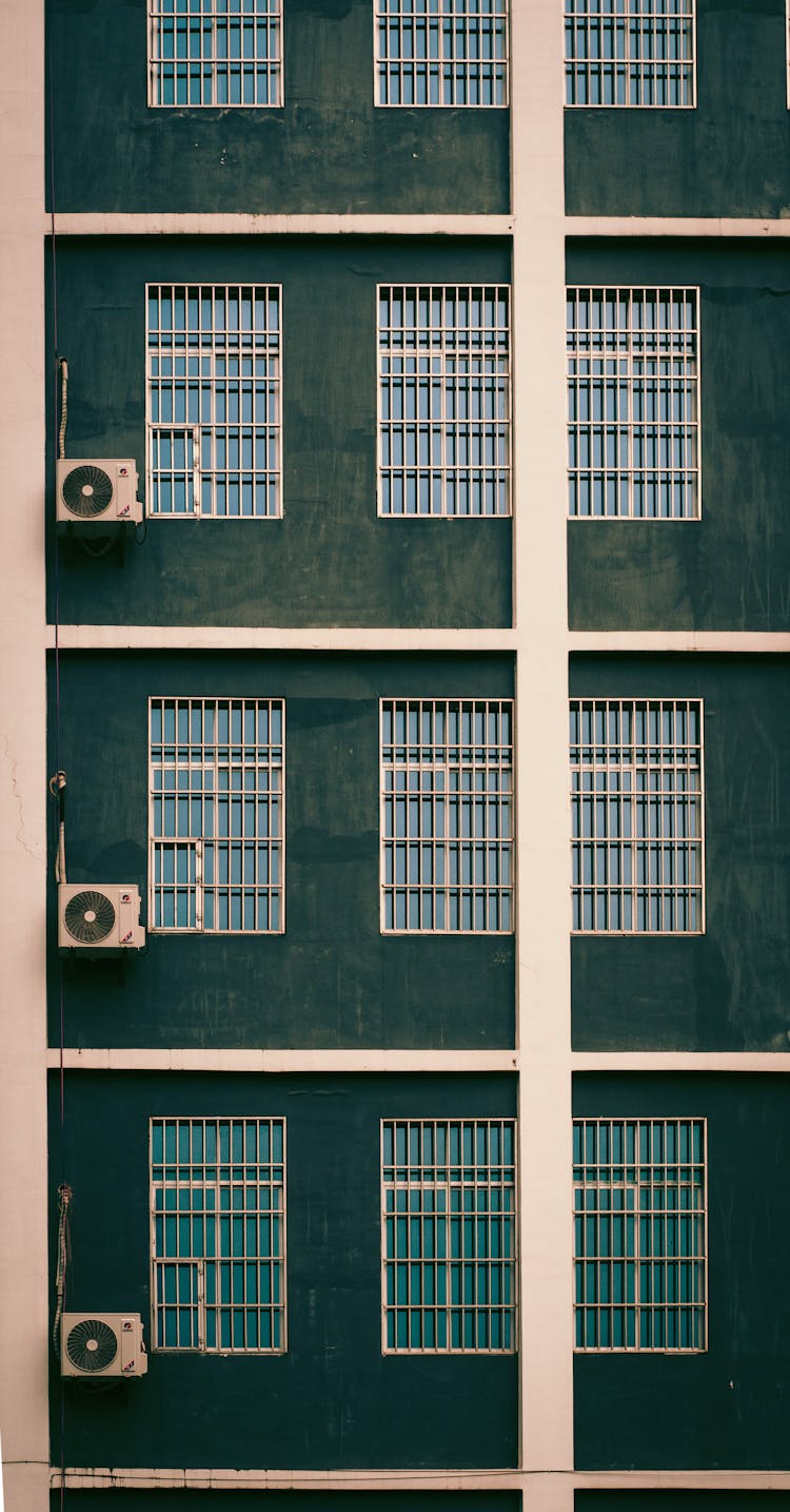 Apartment Building With Aircon Condensers 