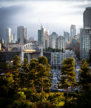 Beautiful urban cityscape of Vancouver with lush greenery and iconic bridge, capturing the vibrant atmosphere.