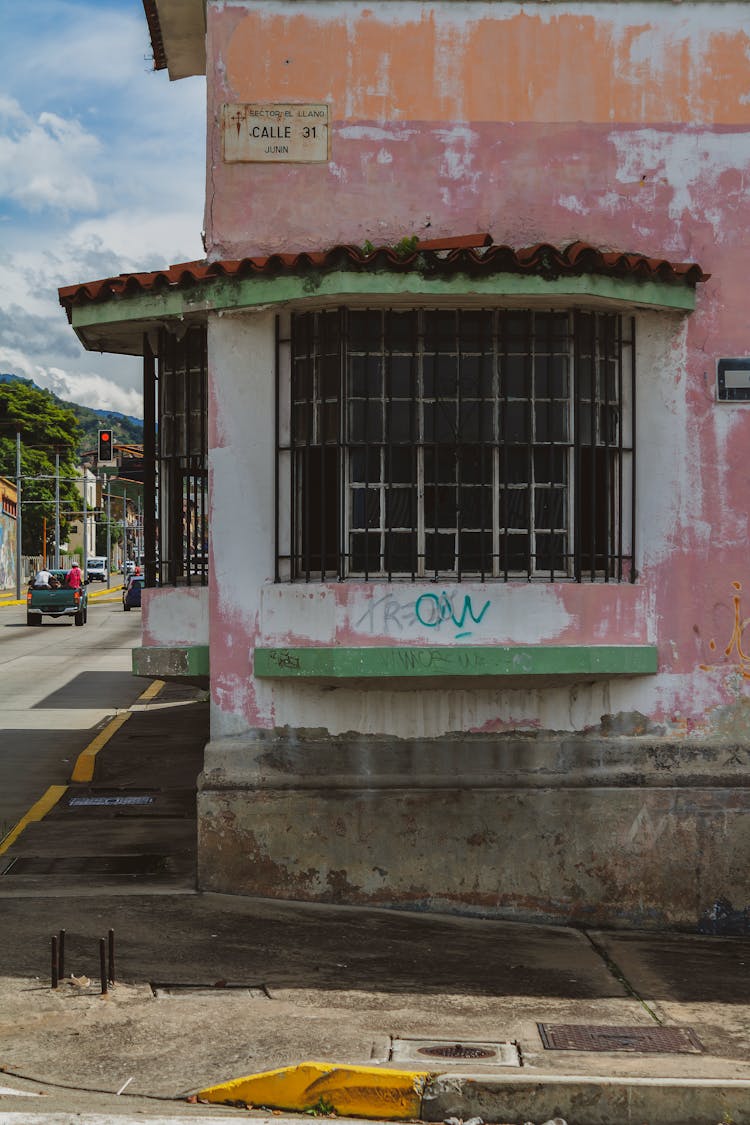 An Abandoned House At The Corner Of The Street