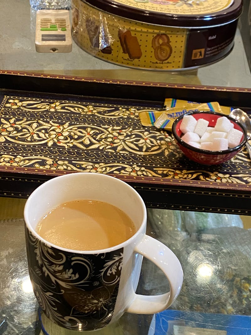 Breville espresso machine brewing coffee