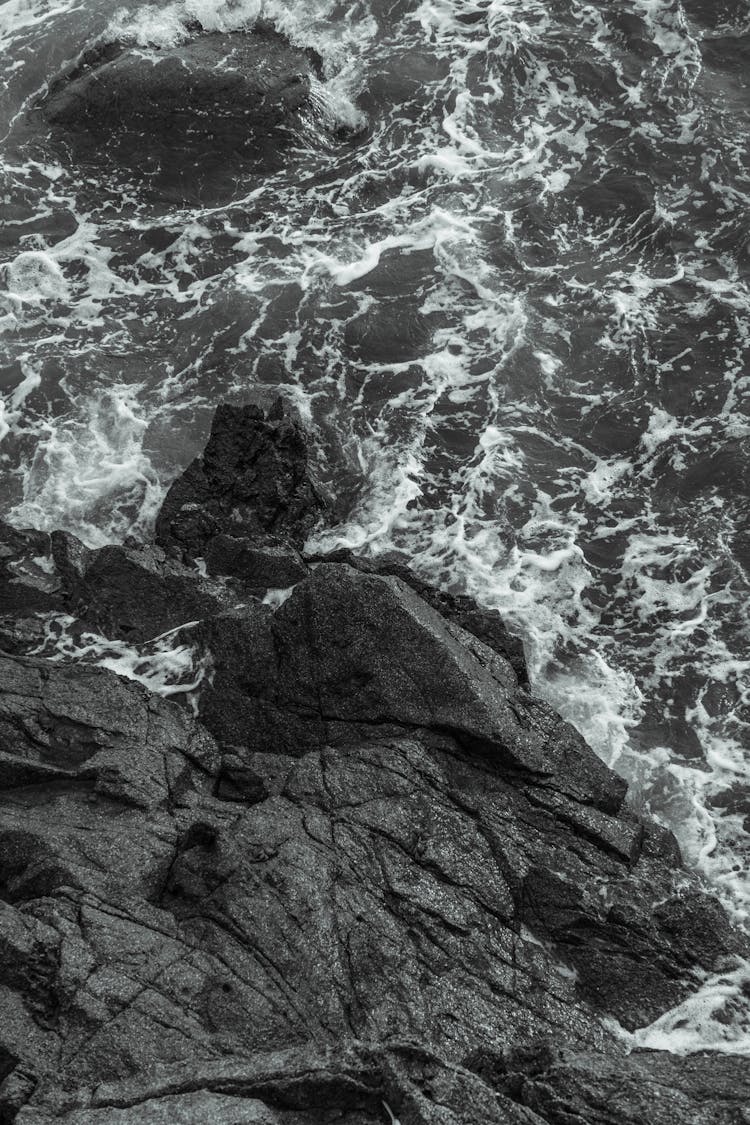 Top View Of A Rock On The Sea 